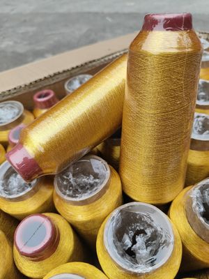 125g Κωνικό υλικό 100% πολυεστέρα Μεταλλική κεντή νήμα τύπου MS καθαρό χρυσό 150D 120D για πλέξιμο